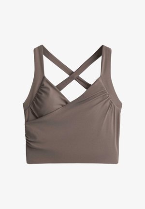 Bez rękawów krótki top w kolorze taupe z krzyżującymi się ramiączkami na plecach i lekko marszczonym detalem po boku.