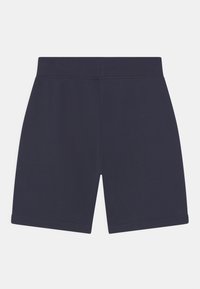 Marineblaue Shorts aus weichem Stoff, mit einem elastischen Bund und geradem Schnitt. Glatte Textur ohne sichtbare Muster oder Akzente.