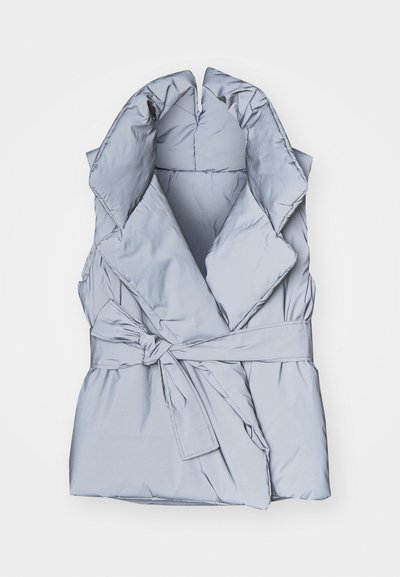 Light blue puffer vest with a wide, folded collar, cinched waist, and side tie. Shiny, quilted texture with horizontal stitching detail.