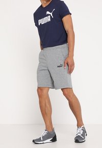 Puma Triko s potiskem - dark blue