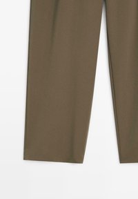 Olive green trousers with a smooth texture, straight cut legs, and a clean finish. No visible buttons or accents.