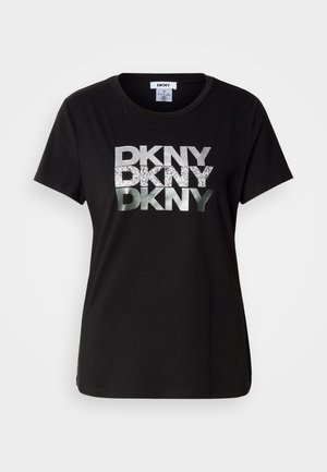 Black cotton t-shirt featuring large metallic silver and glittered "DKNY" logo printed across the front. Short sleeves and crew neck design.