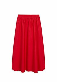 Jupe rouge, de longueur genou, fabriquée en tissu léger. Elle possède une taille élastique et un design fluide avec une texture douce.