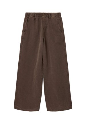 Brune bukser med vidde og elastisk talje samt sidelommer, lavet af blødt, afslappet stof.