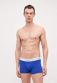 Tommy Hilfiger SIGNATURE TRUNK 7 PACK - Calzoncillos - orange/blue/black/petrol/bordeaux/light blue/grey