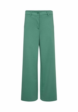 Grønne bukser med vide ben, knap og bæltestropper, glat front og uden synlige lommer, vist på hvid baggrund.