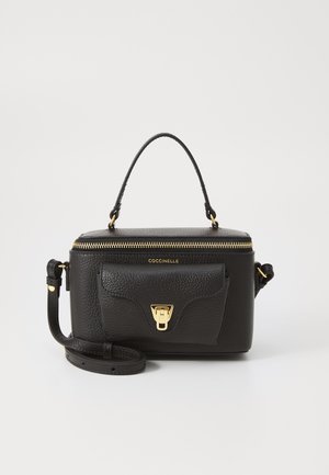 Black leather handbag with a structured design, gold hardware, top handle, detachable shoulder strap, and a front pocket with a clasp.