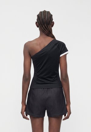 Adidas Originals ADILENIUM T Shirt Women's — foto 3