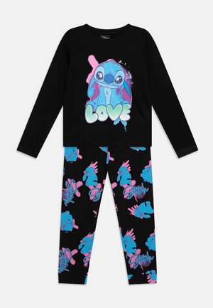 Top preto de mangas longas com um gráfico colorido de "Love" do Stitch, combinado com leggings pretas com designs repetidos do Stitch em azul e rosa.