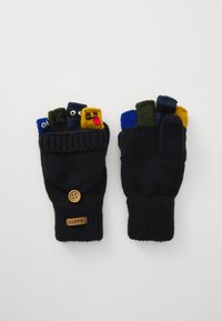 Black knitted fingerless gloves with a cuff, featuring multicolored finger accents. A wooden button and a fabric label are visible.