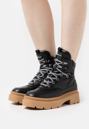 Winter boots - black comb