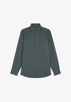 Long-sleeve shirt in dark grey fabric, collared with a button placket, featuring a small logo on the left chest and a curved hem.