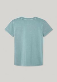 Camiseta de manga corta en algodón azul claro, con cuello redondo, textura suave y dobladillo recto, que exhibe un diseño simple y minimalista.