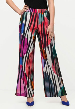 I pantaloni palazzo presentano un motivo astratto multicolore con audaci strisce nere verticali e cerchi vivaci in rosa, blu e arancione. Vita elastica.
