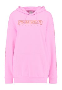 Felpa con cappuccio rosa, dotata di tasca a kanga frontale, cappuccio con cordino e logo PUMA. Presenta maniche lunghe con testo grafico lungo il lato.