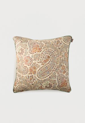Decorative square pillow with beige background and intricate orange, brown, and green paisley floral patterns, green piping along edges.