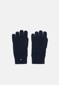 Guanti lavorati a maglia blu navy con polsini a coste, design a cinque dita e piccolo dettaglio del logo tricolore sul polso.