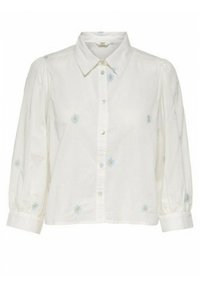 Blouse blanche à boutons avec manches bouffantes, ornée de broderies florales bleu clair. Confectionnée dans un tissu texturé, avec un col classique et des poignets.
