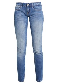 Jeans ajustados de color azul con ligeros desvanecimientos y detalles desgastados, que cuentan con bolsillos delanteros y traseros y presillas para el cinturón.