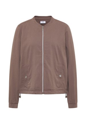 Lysebrun lynlåstrøje i tekstureret stof med rund krave, to forlommer med trykknapper og elastiske manchetter.