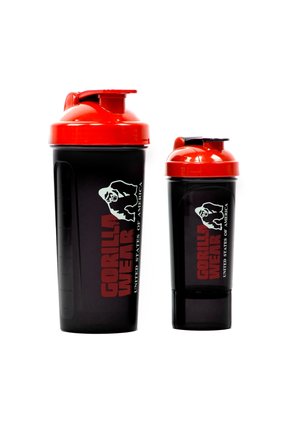 Two black shaker bottles with red lids. The larger has a printed logo; both feature measurement markings on the side.