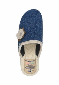 Ciabatta di lana blu con superficie strutturata, forma arrotondata e un accento floreale in feltro. Interno foderato in morbido materiale beige.