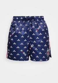 Costume da bagno navy con finitura lucida, caratterizzati da un motivo a fleur-de-lis bianco e rosso, testo "PARIS" e un'etichetta con logo sull'orlo.