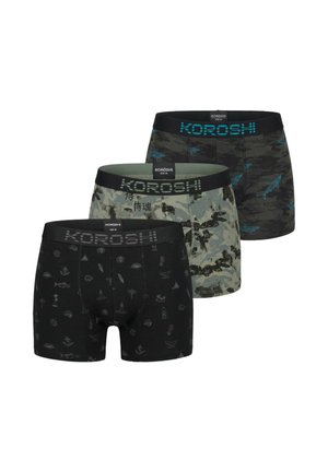 Ensemble de trois boxers pour hommes Koroshi avec des motifs requin en camouflage noir, gris et camouflage foncé, chacun arborant le logo de la marque sur la ceinture.