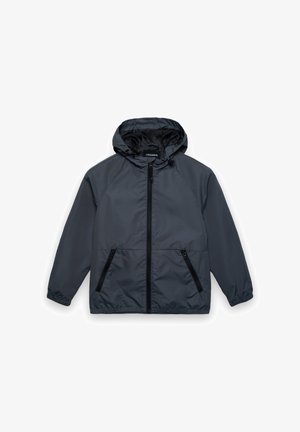 Giacca antivento leggera grigia con cappuccio, dotata di zip frontale, due tasche laterali con zip e polsini elastici.