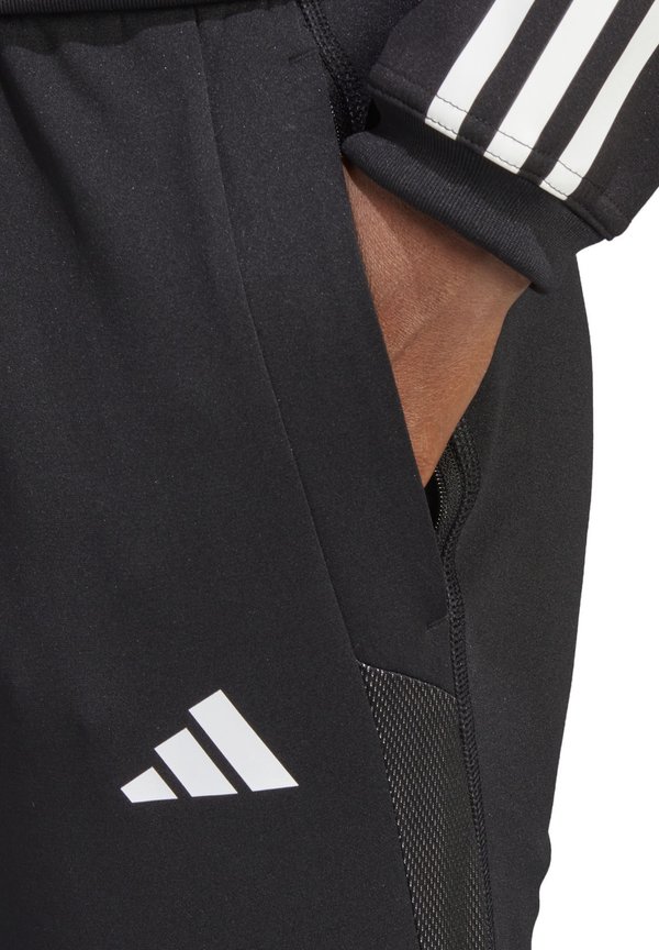 FUSSBALL TEAMSPORT  TIRO 23 COPTION  - Jogginghose - schwarzweiss