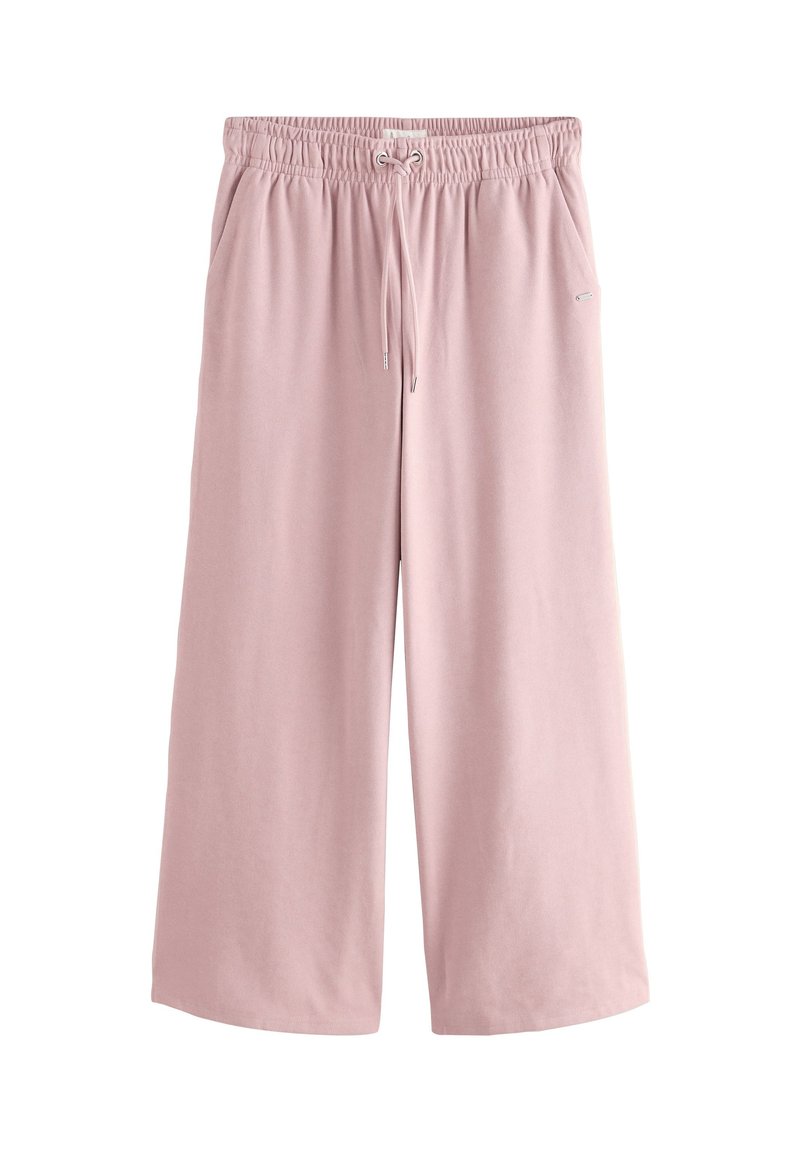 Pink, wide-leg pants made from soft fabric. Features an elastic waistband with a drawstring and side pockets. Smooth texture.