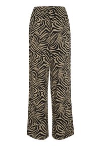 Pantalons larges en tissu beige avec un motif de rayures zebre noires. Taille élastique, design fluide et texture légère.