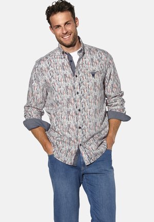 Hemd mit Knopfleiste und einem mehrfarbigen vertikalen Muster auf hellem Hintergrund, mit kontrastierendem Kragen und einer einzelnen Brusttasche.