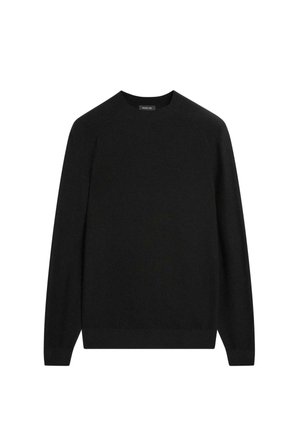 Maglione nero in design a maglia semplice con collo rotondo e maniche raglan. Presenta un bordo a costine sull'orlo e sui polsini per un tocco di texture in più.