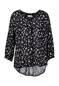 Schwarze Bluse mit V-Ausschnitt, dreiviertel langen Ärmeln und fließender Silhouette. Geschmückt mit mehrfarbigen Punkten in Weiß und Pink.