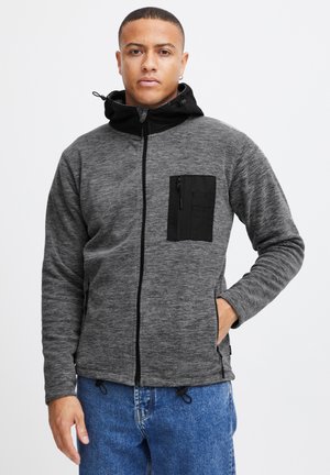 Gray fleece jacket with a black hood, featuring a zip pocket on the chest and drawstrings at the hem for adjustment.