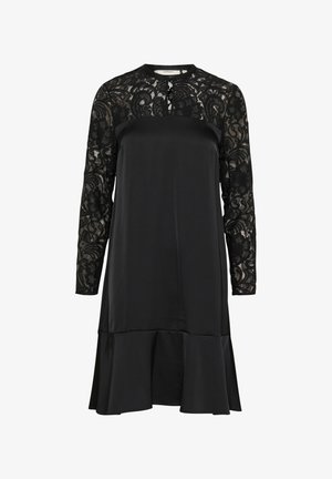 Schwarzes Kleid mit langen Spitzenärmeln, satinierter Korsage, rundem Ausschnitt und ausgestellt geschnittenem Saum. Die Spitze zeigt florale Muster und kunstvolle Details.