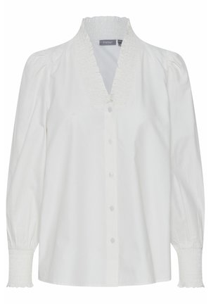 Valge nööpidega pluus smockitud kaelusega, pikkade puffvarrukatega ja nööpidega ees. Pehme, siledast puuvillast kude.