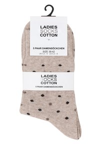 Calze da donna in cotone beige con pois neri. La confezione contiene cinque paia, taglia 39-42. Presentate con un'etichetta appesa.