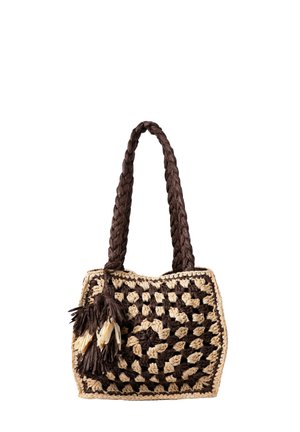 Sac à main tissé marron et beige avec anse tressée et accents pompons, fabriqué en fil épais selon un motif carré.