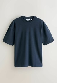 Navy blue t-shirt in soft fabric, featuring a round neckline and short sleeves with a relaxed fit. Simple, solid design without patterns.