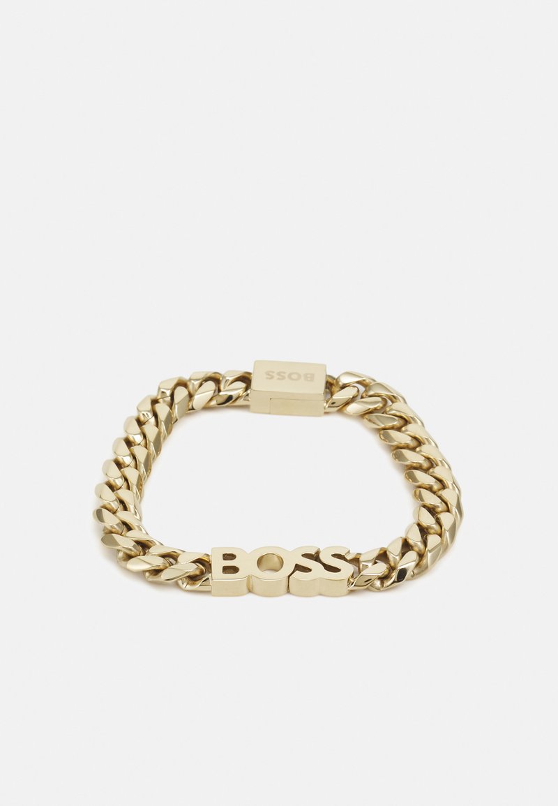 Pulsera de cadena en tono dorado con un gran logo entrelazado de "BOSS". Acabado suave y brillante con un diseño de cierre resistente.
