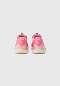 Pink athletic shoes with a smooth fabric upper, cushioned sole, and a contrasting light sole. Rear features the text "REPETITOR."