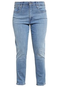 Vaqueros de mezclilla azul claro con un diseño ligeramente desgastado. Estilo de cinco bolsillos con cierre de cremallera y botón. Corte recto.