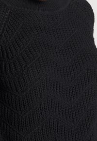 Object Stickad tröja - black