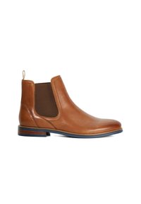 Men’s tan leather Chelsea boot with elastic side panel and pull tab, low stacked heel, and rounded toe.