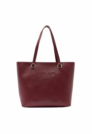 Bolso tote burdeos con material sintético texturizado, logo en relieve y dobles asas para el hombro. Cuenta con una forma estructurada y detalles en metal dorado.