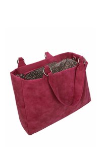 Sac cabas en daim rose vif avec des anneaux argentés, des anses larges et une doublure intérieure marron à motifs partiellement visible.