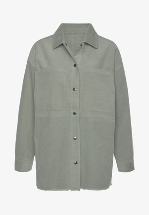 Žalia velveto marškininė striukė su mygtukų užsegimu ir dviem krūtinės kišenėmis. Yra apykaklė ir šiek tiek nutrintas kraštas.