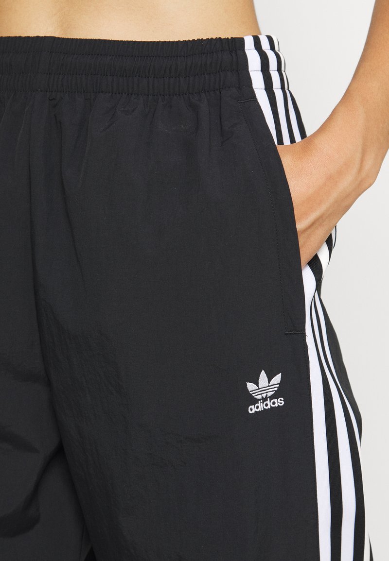 Significativo Igualmente femenino adidas Originals ADICOLOR CLASSICS LOCK-UP - Pantalones deportivos -  black/negro - Zalando.es